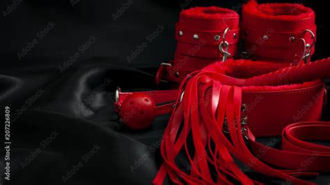 Bondage Kinky Adult Sex Games Kink And Bdsm Lifestyle Concept With A Pair Of Red Leather