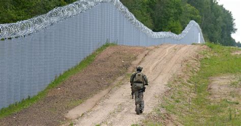 Latvia sends army to guard border with Belarus as illegal crossing ...