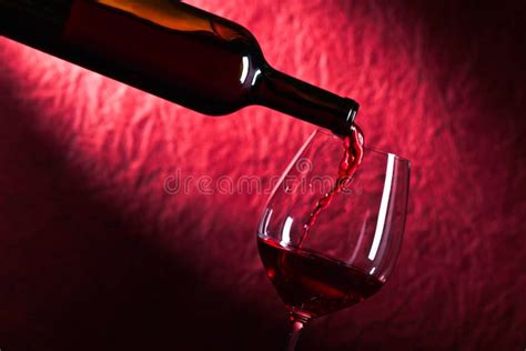 Bottle And Glass Of Red Wine On A Dark Background Stock Image Image