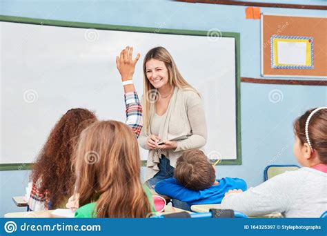 Teacher In The Class Asks Questions Stock Image Image Of Solution Teacher 164325397