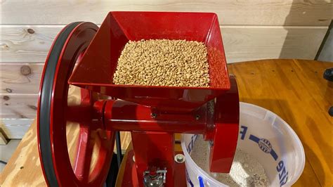 Grinding Wheat Berries Into Flour GrainMaker 99 Food Mill YouTube