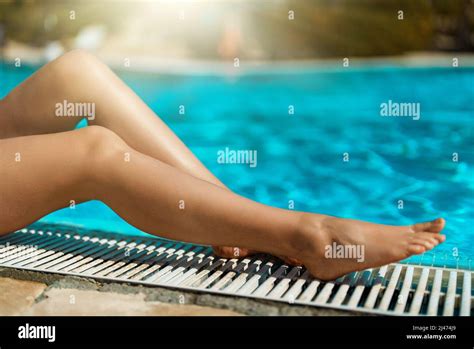 Woman Lying Near The Swimming Pool Stock Photo Alamy