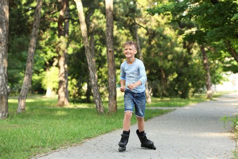 Little Happy Boy Roller Skating Stock Photo - Image of city, leisure: 156575412