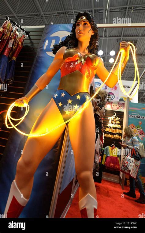 A Large Scale Wonder Woman Figure With A Glowing Lasso Of Truth On