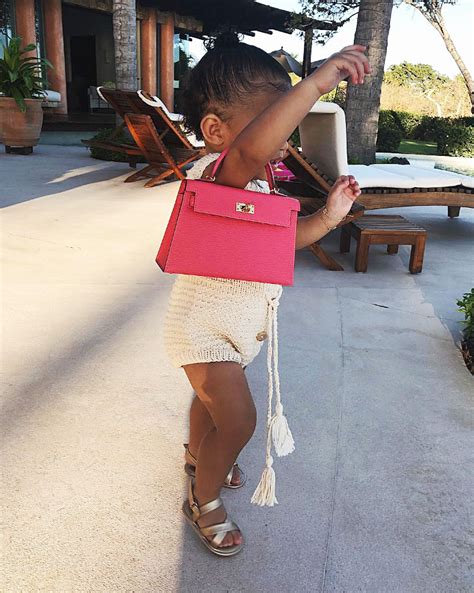 Kylie Jenners Daughter Stormi ‘wont Let Go Of Purse In Video Us Weekly