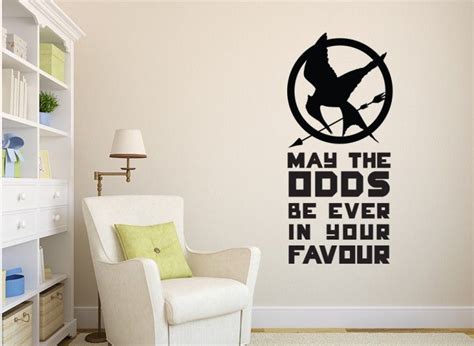 This Fantastic Hunger Games Wall Art Sticker Reads May The Odds Be Ever In Your Favour With