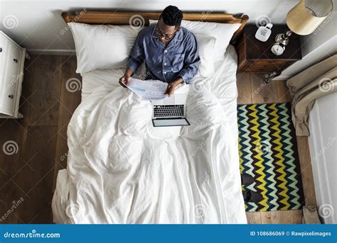 Business Man in Bed Working Stock Image - Image of connection, bored ...