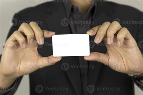 A Man S Hand Holding White Card For Inter Card Concept Design And