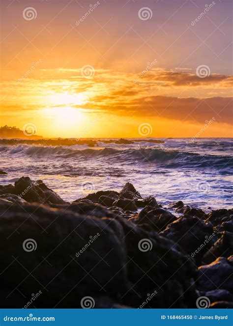 Sunrise Over the Beach in Kauai, Hawaii Stock Photo - Image of water ...