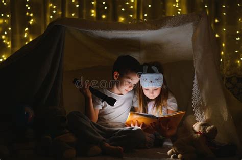 Little Children Reading Bedtime Story at Home Stock Photo - Image of ...