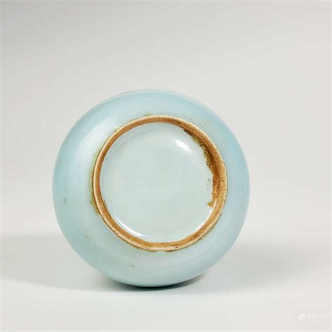 Bidlive A Celadon Glazed Porcelain Vase