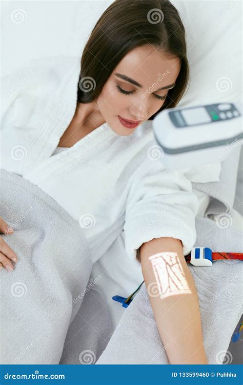 Medical Procedure. Woman Scanning Veins with Vein Finder Stock Photo ...