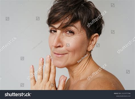 Mature Halfnaked Woman Smiling Looking Camera Stock Photo