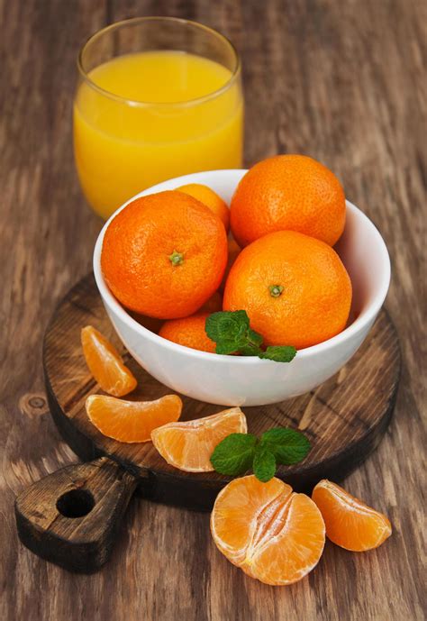 Glass of tangerine juice 5937189 Stock Photo at Vecteezy