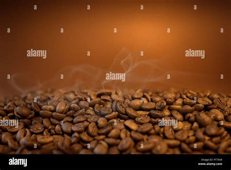 Hot Coffee Beans Background Stock Photo Alamy