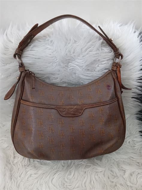 Dooney And Bourke 1975 Signature East West Collins Bag Luxury Bags