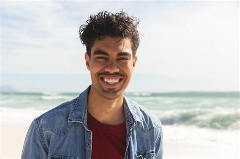 Premium Photo Portrait Of Smiling Biracial Man Wearing Denim Shirt At