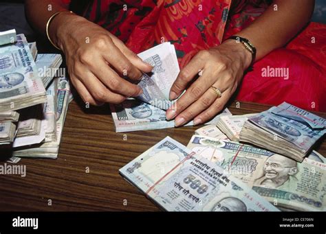 Indian Woman Counting Money By Hand India Asia Stock Photo Alamy