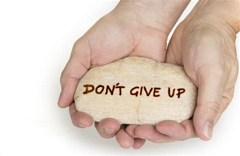 Pebble Stone In Hands Concept For Don T Give Up Sign Stock Image