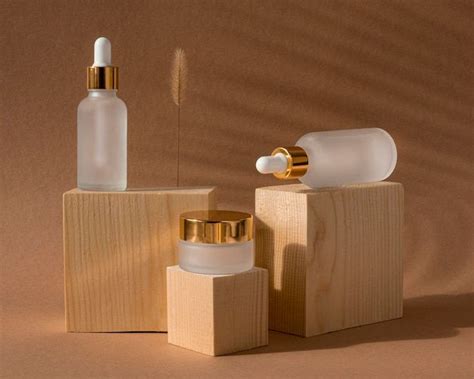 Premium Photo Front View Skin Oil Droppers And Face Cream Recipients