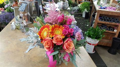 Pink and orange flower arrangements for wedding and events | Flower arrangements, Orange flowers ...