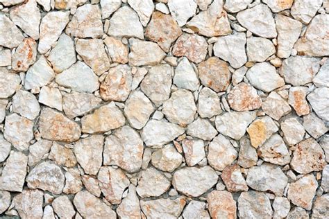 Viejo Muro Beige Con Textura De Fondo De Mamposter A De Piedra Foto