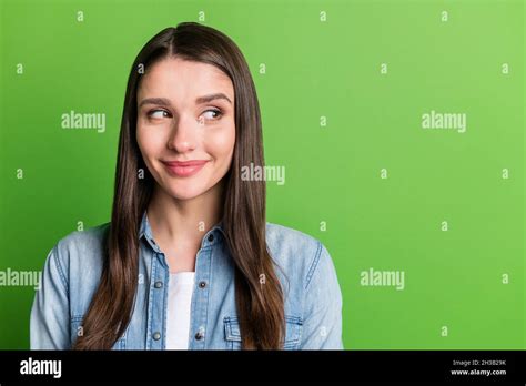 Portrait Of Attractive Curious Cheerful Girl Looking Aside Guessing