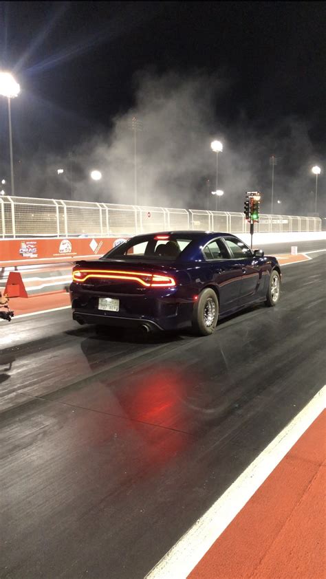 Stock 2016 Dodge Charger Hellcat 1/4 mile trap speeds 0-60 - DragTimes.com