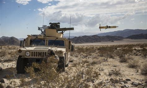 Usmc Gunner Fires A Bgm 71 Tow Missile Downrange Military Tank