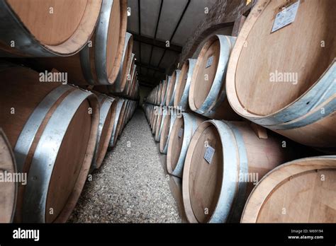 Wine Barrels Stacked In Old Winery Cellar Stock Photo Alamy