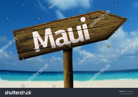 Maui Hawaii Wooden Sign With A Beach On Background Stock Photo