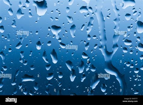 Rain droplets on a window Stock Photo - Alamy