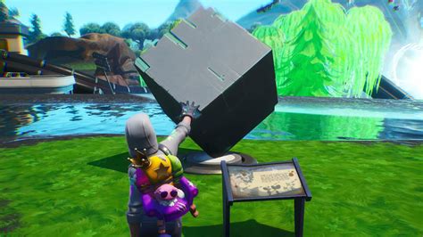 Fortnite Memorial to a Cube in the desert and by a lake locations: Where to visit the Kevin ...