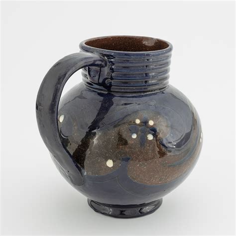 Alfred William Finch A Glazed Earthenware Jug Iris Finland Circa