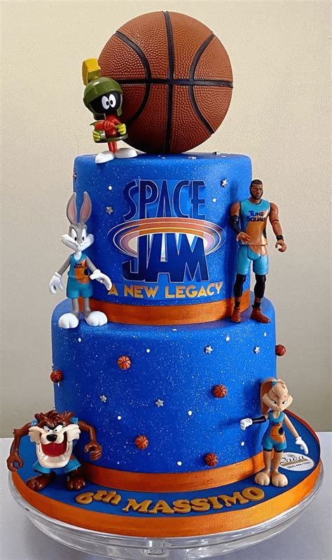 A Birthday Cake Made To Look Like A Basketball And Other Sports Related