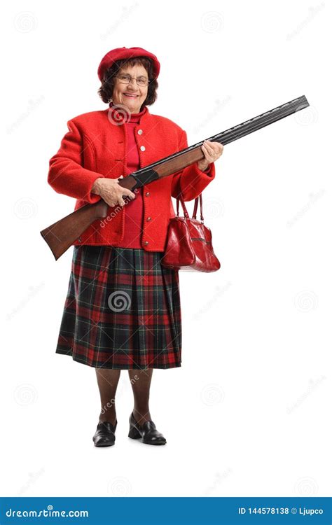 Senior Lady Smiling And Holding A Shotgun Stock Photo Image Of