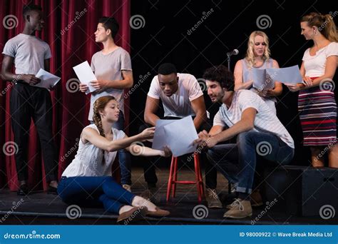 Actors Reading Their Scripts on Stage Stock Photo - Image of clothing ...