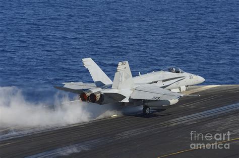 An Fa 18f Hornet Launches Photograph By Stocktrek Images Fine Art America