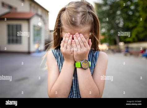 Child Hiding Face