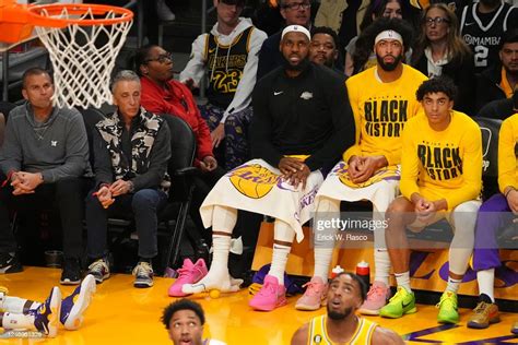 Los Angeles Lakers Lebron James In Action Sits On The Bench And