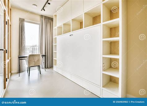 Spacious Study Room With Table And Shelves Stock Photo Image Of