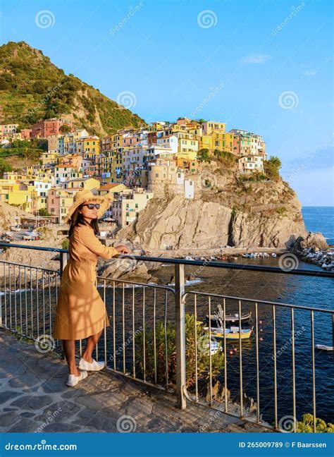 Asian Thai Women With A Hat Visiting Manarola Village Cinque Terre