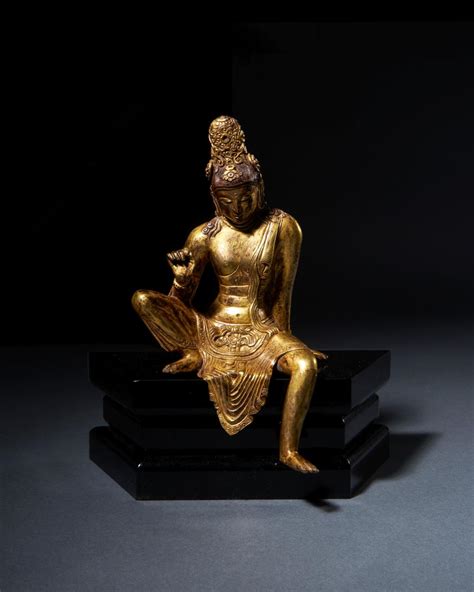 Sold At Auction A LARGE AND IMPORTANT GILT BRONZE FIGURE OF