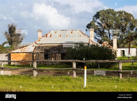 Old Style Australian Homestead Abandoned And Decaying With Metal Roof