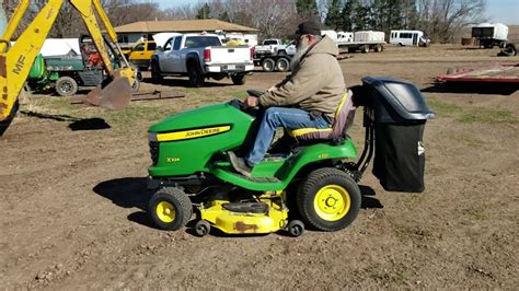 John Deere X324 4 Wheel Steer Riding Lawn Mower With Blower And Bagging