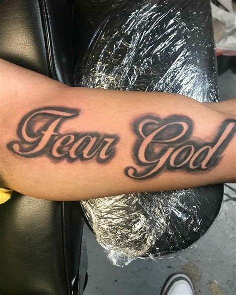 11 Fear God Tattoo Designs That Will Blow Your Mind