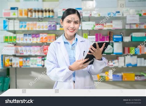 Portrait Female Pharmacist Using Tablet Modern Stock Photo 2175901851 ...