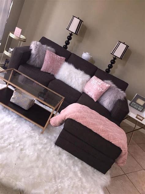 Dark Brown Couch With Accent Light Pink Light Grey And White Pillows