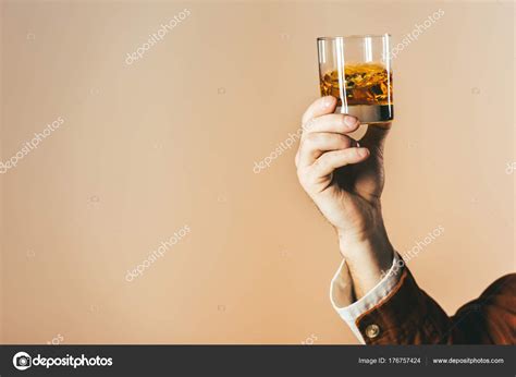 Cropped Shot Man Holding Glass Whiskey Isolated Beige Stock Photo By