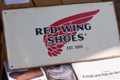 Red Wing Shoes Logo Sign and Brand Text on Store Facade Clothing Shop ...